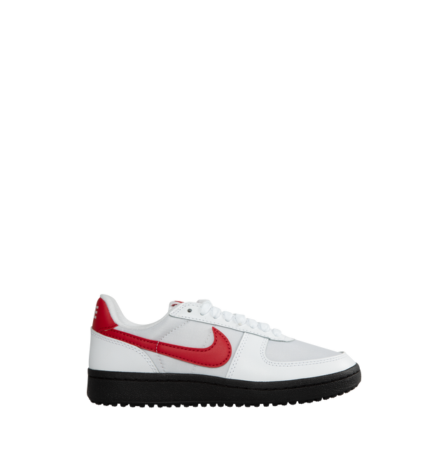Image 1 of 5 - WHITE - NIKE Field General '82 in White and Varsity Red with a vintage gridiron look and red Swoosh.  A mix of smooth leather, synthetic leather and tough textiles come together in classic White and Varsity Red, resting atop a nubby Black rubber waffle sole.  Featuring textile Upper with leather overlays, woven tongue label, printed branding at back and rubber outsole. 