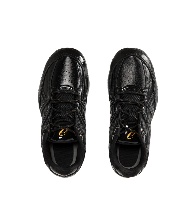 Image 5 of 5 - BLACK - Asics Hypersync Sneakers are inspired by the brand's archived wrestling and track & field footwear, combining heritage design with modern comfort. Featuring a breathable air mesh upper with textured patent leather overlays, decorative stitching, and premium gold logo detailing, these designer sneakers deliver a sleek, low-profile silhouette. Finished with an OrthoLite sockliner for enhanced cushioning, a durable AHARPLUS rubber outsole inspired by the SNAPDOWN wrestling shoe, and a no