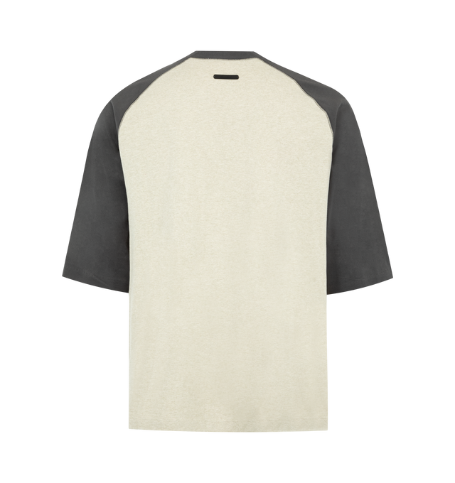 Image 2 of 2 - NEUTRAL - FEAR OF GOD ESSENTIALS Signature Baseball Tee featuring medium-weight cotton jersey, rib-knit crewneck tee, an oversized fit with baseball-inspired 3/4 raglan sleeves that contrast in color, an embroidered Essentials signature logo on front and an Essentials signature label at the back collar. 100% cotton.