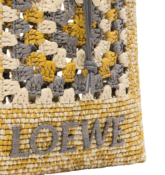 Image 5 of 5 - MULTI - LOEWE PAULA'S IBIZA Drawstring pocket in classic calfskin and raffia featuring a classic calfskin strap adjustable via an Anagram Pebble dice and a contrast LOEWE embroidery, shoulder or crossbody carry, unlined and engraved Anagram. Raffia/calf. 21 cm x 16 cm x 1 cm. Made in Spain.