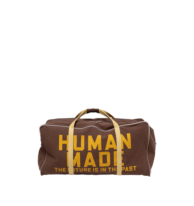 Image 1 of 8 - BROWN - HUMAN MADE Canvas Boston Bag Large featuring thick, tough cotton canvas, bio-washed for a vintage-like feel, graphics appear on both sides, external pocket and an internal zip pocket, heart-shaped rivets and 100L capacity. 100% cotton.