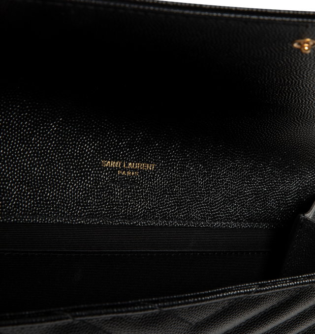 Image 3 of 3 - BLACK - SAINT LAURENT Envelope Wristlet Clutch featuring snap button closure, grosgrain lining, one main compartment and one flap pocket. 8.2 X 6.2 X 1.1 inches. 100% calfskin leather.