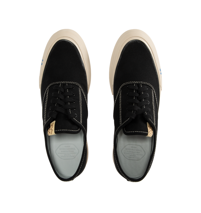 Image 5 of 5 - BLACK - VISVIM Logan Deck Lo Sipe Sneaker featuring Japanese high twist cotton canvas upper, rubber outsole, pigment free leather lining and cork insole for enhanced cushioning and moisture absorption.