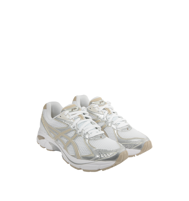Image 2 of 5 - NEUTRAL - Asics GT-2160 sneaker with a sleek aesthetic and wavy forefoot sculpting, featuring a segmented midsole structure and GEL technology inserts for advanced cushioning. Unisex style in men's sizing.