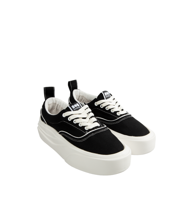 Image 2 of 9 - BLACK - NAHMIAS Ollie Sneaker featuring round rubber cap toe, lace up closure, textile logo patch at tongue, branded logo detail on outsole lip, padded tongue and collar, treaded logo outsole, rubber midsole, logo emboss on heel and logo gum bottom.
