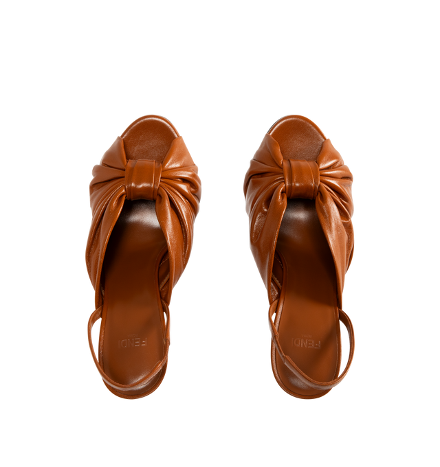 Image 4 of 4 - BROWN - FENDI Arco Slingbacks featuring almond-shaped toe, soft elasticized strap, double band gathered into a bow, sculpted high-heel covered in tone-on-tone nappa leather and gold-color metal bar engraved with the Fendi logo. Heel height: 95mm. 100% lambskin, inside: 100% calfskin. Made in Italy.