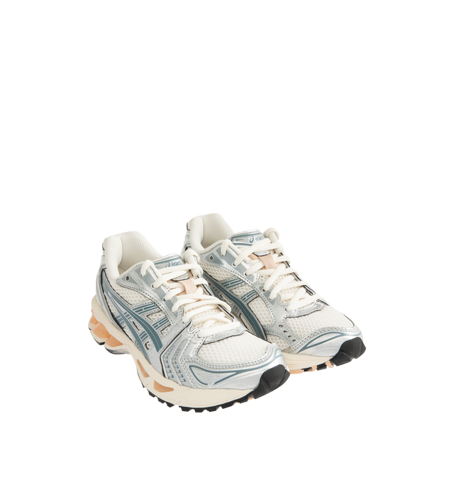 Image 2 of 5 - SILVER - Asics GEL-Kayano 14 Sneakers are lace-up style with rip-stop underlays, GEL cushioning, and TRUSSTIC support system. Unisex style in men's sizing.