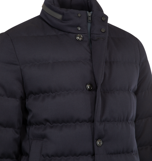Image 5 of 5 - NAVY - MONCLER Vallonpierre Hooded Long Down Jacket featuring Aquaflect, nylon lining, down-filled, detachable and adjustable hood, collar with leather trim, zipper and snap button closure, pockets with zipper and snap button closure, adjustable cuffs, hem with drawstring fastening and leather logo patch. 100% virgin wool. Lining: 100% polyester. Padding: 90% down, 10% feather. Made in Romania.