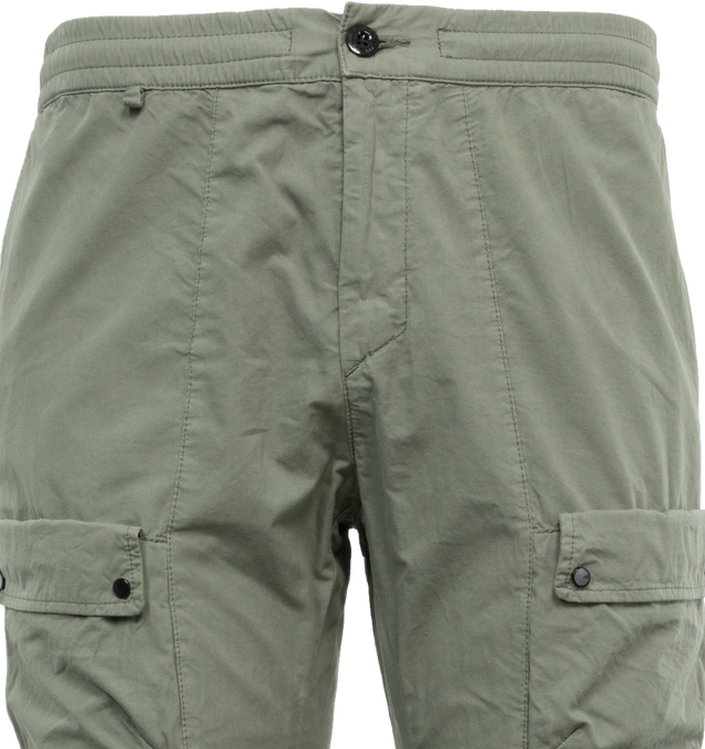 Image 4 of 4 - GREEN - C.P. COMPANY Microreps Cargo Track Pants featuring zip fly and button fastening, slant pockets, secure utility pockets at front and back welt pockets. 100% cotton. 