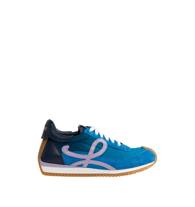Image 1 of 5 - BLUE - LOEWE Flow Runner 2.0 featuring an updated ultra-flexible and lightweight construction, signature honey-coloured rubber outsole that extends from the toecap to the back of the heel, 25mm heel, signature L monogram on the side, embossed Anagram on the tongue and Gold embossed LOEWE on the heel tab. Runs a half-size larger. If between sizes, choose the smaller size. Nylon/Calf. Made in Italy.