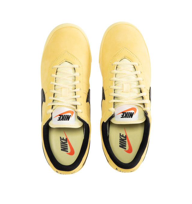 Image 5 of 5 - YELLOW - NIKE Astrograbber Sneaker featuring an American football shoe with a leather upper, padded, low-cut collar, tonal rubber midsole and waffle outsole.