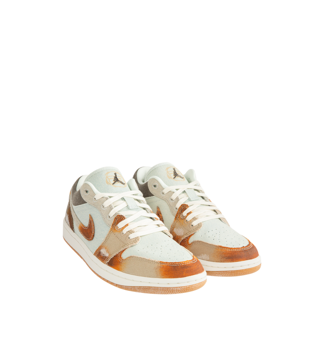 Image 2 of 5 - MULTI - JORDAN Air Jordan 1 Low SE Sneaker featuring fabric panels with frayed edges and distressed details, paint-like splatters, shimmering Wings logos on the heel, metallic Jumpman branding on the tongue, low top and gum outsole.