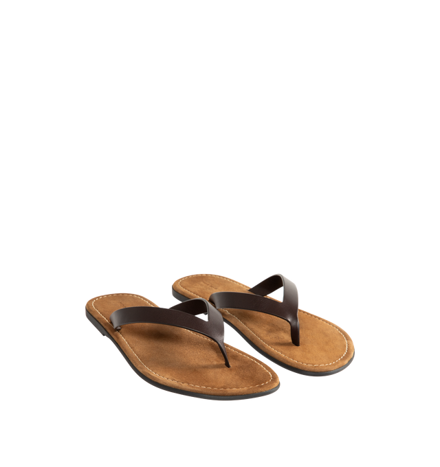 Image 2 of 4 - BROWN - THE ROW Beach Flip Flop featuring vegetable-tanned calfskin leather with seamless strap, padded goatskin insole and rubber sole. 100% calfskin leather. Synthetic sole. Made in Italy.