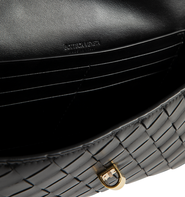 Image 3 of 3 - BLACK - BOTTEGA VENETA Andiamo Clutch featuring top handle, intrecciato leather with signature metallic knot closure, six card slots and one additional pocket. 5.1" x 12.2" x 1.2. Lambskin, calfskin. Made in Italy.