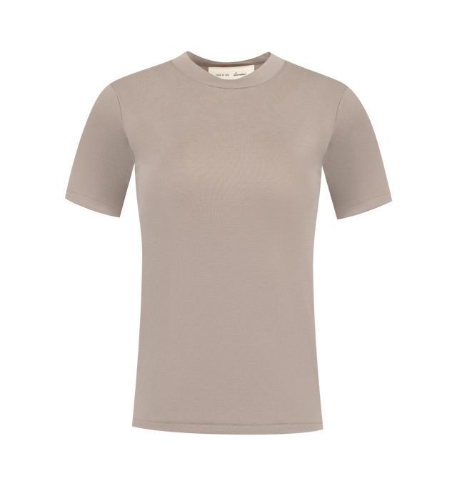 Image 1 of 2 - NEUTRAL - Fear of God Essentials Womens Shrunken Baseball Tee is crafted from lightweight tri-blend jersey. Features a slim cropped fit, rib-knit crew neckline, raglan short sleeves, and signature Essentials label at the back collar. Main Material: 53% Cotton, 40% Polyester, 7% Rayon.