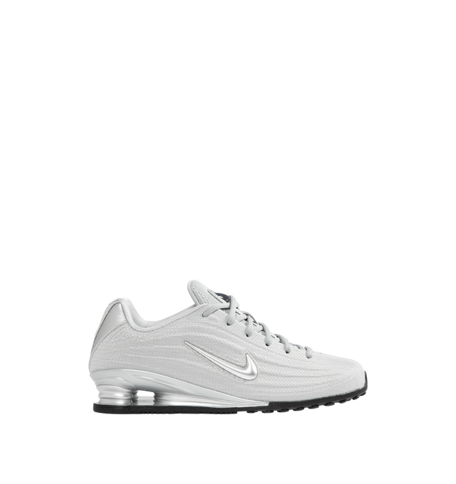 Image 1 of 5 - SILVER - NIKE Shox Z Sneaker featuring a slim, low-profile shape, textile upper, synthetic leather accents, Nike Shox columns, circular Waffle outsole, foam midsole and rubber outsole.