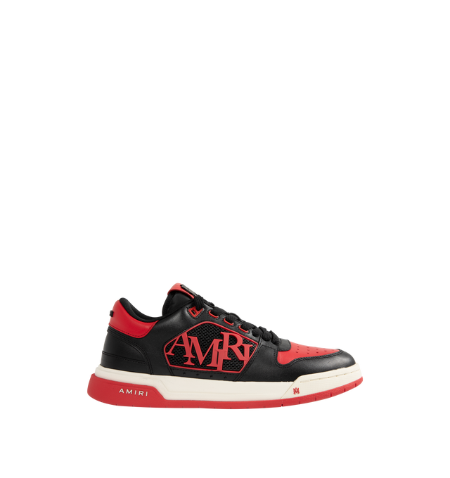 Image 1 of 5 - RED - AMIRI Classic Low Sneakers featuring low-top, buffed leather, graphic perforated detailing throughout, logo bonded at padded tongue, padded collar, rubberized logo appliqu at sides, logo bonded at heel counter and treaded rubber sole. Upper: leather. Sole: rubber.