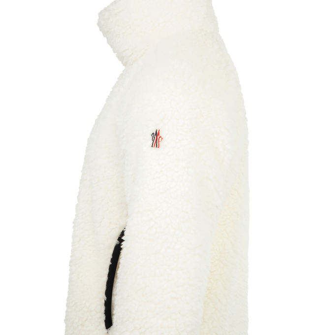 Image 3 of 3 - WHITE - MONCLER GRENOBLE Teddy Turtleneck Sweatshirt featuring nylon mesh lining, turtleneck, side pockets and elastic trim. 100% polyester. Lining: 100% polyamide/nylon. Made in Italy.