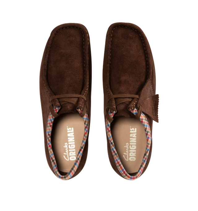 Image 4 of 4 - BROWN - CLARKS Wallabee Shoe featuring suede uppers, two FOBS Clarks Originals and Wallabee, two laces, natural pebble crepe sole, Clarks Originals logo foil embossed on sock, Harris Textile print trim on collar, moccasin construction and hand stitched apron seam.
