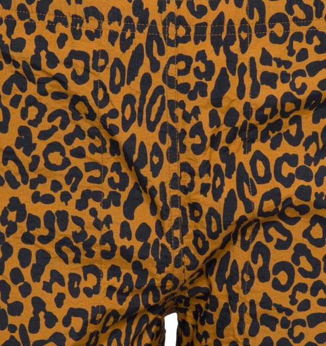 Image 4 of 4 - BROWN - NOAH LEOPARD SWIM TRUNKS crafted from 100% nylon with all over print and mesh liner. Elastic drawstring waist, on-seam front pockets, flap back pocket with snap closure and drain vent. Made in Portugal. 