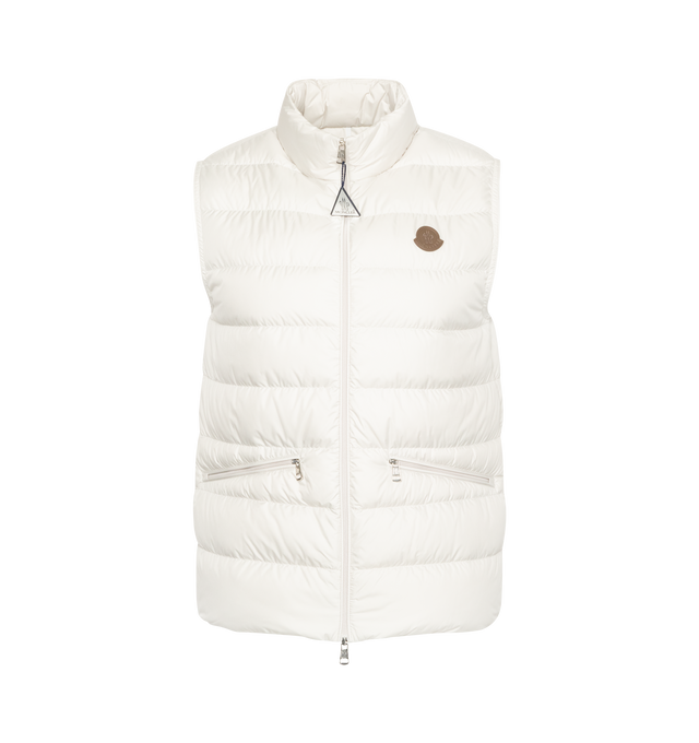 Image 1 of 2 - WHITE - MONCLER Treompan Down Vest featuring lightweight micro chic lining, down-filled, collar with snap button closure, zipper closure and zipped pockets. 100% polyester. Padding: 90% down, 10% feather. 