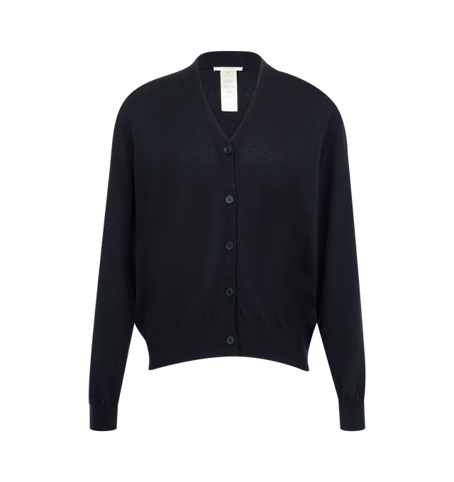 Image 1 of 2 - NAVY - THE ROW Otie Cardigan featuring seamless v-neck cardigan in lightweight cashmere with relaxed fit, subtle shawl collar, ribbed cuffs and hem and horn button closure. 100% cashmere. Made in Italy.