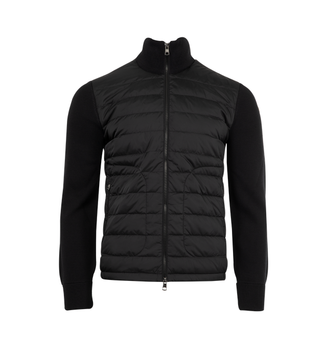 Image 1 of 3 - BLACK - MONCLER Padded Zip-Up Cardigan featuring a wool blend, down-filled nylon lger front, gauge 12, zipper closure, zipped pockets and logo patch. 100% polyamide/nylon. 50% acrylic, 50% virgin wool. Padding: 90% down, 10% feather.