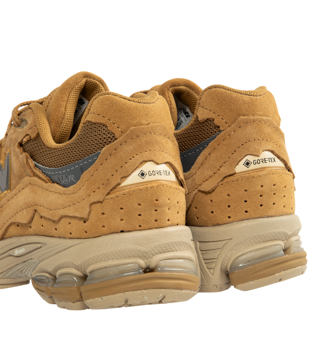 Image 3 of 5 - BROWN - NEW BALANCE 2002DX Sneaker featuring soft French terry fabric, ABZORB midsole, ABZORB SBS heel cushioning, N-ergy technology for superior shock absorption, atability Web outsole technology and GORE-TEX waterproof fabric.