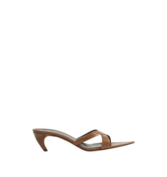 Image 1 of 4 - BROWN - Khaite Women's Sophie Kitten Heel Sandal is crafted from supple goatskin leather and features a minimalist silhouette with crossed straps, a sharply pointed toe, and a sculptural kitten heel. Designed for both elegance and ease, this refined sandal offers exceptional comfort while maintaining its shape through premium kid leather construction. Main Material: Capra Leather (Upper: 100% Kid Leather). Sole: 100% Calfskin Leather. Toe: Pointed. Heel Height: 2.2 in / 5.5 cm. Made in Italy.