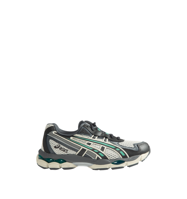 Image 1 of 5 - GREY - ASICS GEL-NYC 2055 Sportstyle sneaker with early 2000s running shoe design influences in the upper's ASICS stripes, heel counter, and eyelet structure. Featuring GEL-CUMULUS 16 shoe's tooling system. Through a combination of lightweight foams and GEL technology inserts, this midsole formation helps create advanced underfoot comfort. Unisex style in men's sizing. Imported from Cambodia.