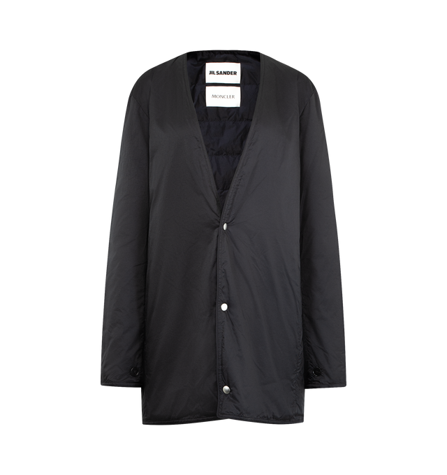 Image 2 of 4 - NAVY - MONCLER GENIUS X JIL SANDER Rhamnose 3-in-1 Wool Mono-Breasted Down Jacket featuring double wool, viscose lining, detachable down-filled nylon inner with snap button closure, button closure and detachable metal logo pin. 100% virgin wool. Lining: 100% viscose/rayon. 100% polyamide/nylon. Padding: 90% down, 10% feather. Made in Italy.