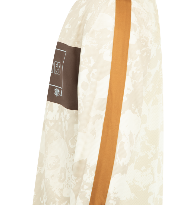 Image 3 of 3 - BROWN - PLEASURES Despair Long Sleeve Jersey featuring a polyester-spandex blend, all-over skull print, Johnny collar, ribbed trims, contrast details, screen-printed branding and regular fit. 94% polyester, 6% spandex.