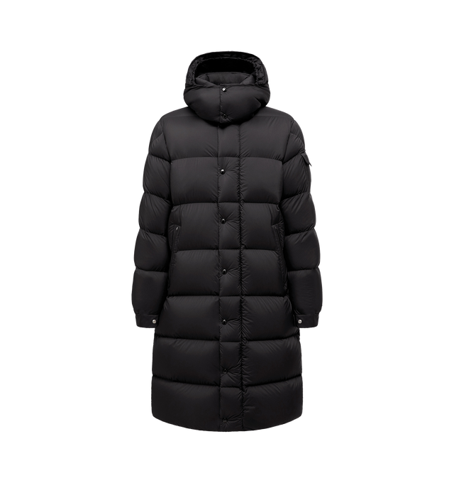 Image 1 of 1 - BLACK - Moncler Men's Hanoverian Long Down Jacket is crafted from water-repellent longue saison nylon and features a loose-fit silhouette, down-filled construction, and a detachable hood for added versatility. Designed for cold-weather protection, it is finished with a front zip and snap-button closure covered by a storm flap, zipped pockets, a sleeve patch pocket, and adjustable cuffs. Main Material: 100% Polyamide / Nylon. Lining: 100% Polyamide / Nylon. Hood Lining: 100% Polyamide / Nylon.
