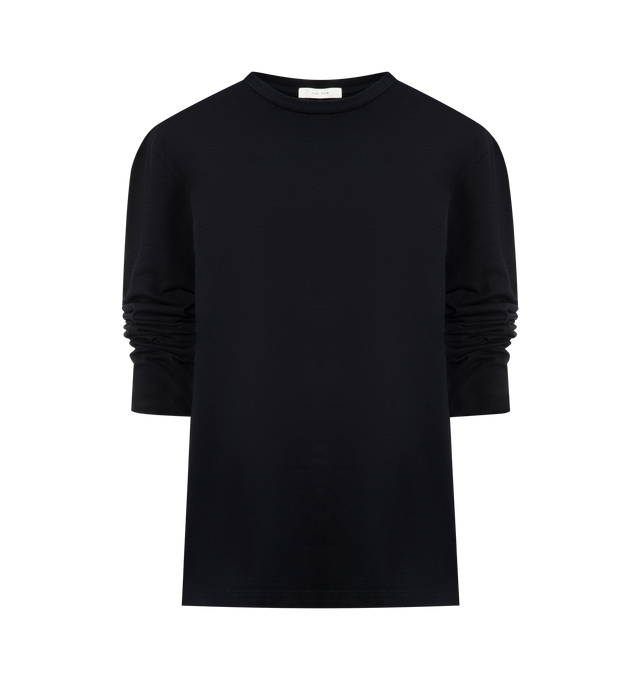 Image 1 of 2 - BLUE - THE ROW Amia T-Shirt featuring relaxed long-sleeved top in textured cotton jersey, ribbed crewneck, signature center back detail and spun from pure cotton slub yarn. 100% cotton. Made in Italy.