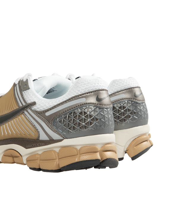 Image 3 of 5 - GREY - NIKE Zoom Vomero 5 Sneaker featuring synthetic leather on the upper, mesh panels and ventilation ports on the heel, Zoom Air cushioning, plastic caging on the side, reflective details and rubber outsole.