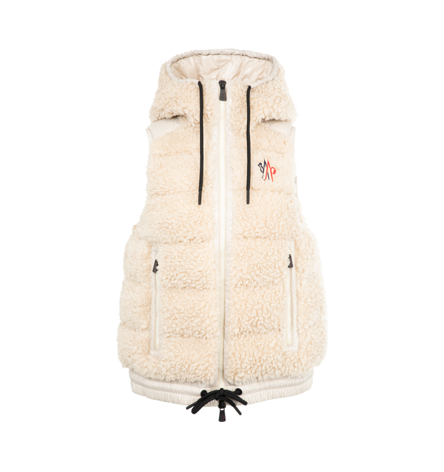 Image 1 of 2 - WHITE - MONCLER GRENOBLE Teddy Fleece Puffer Vest featuring hooded neckline with adjustable drawstrings, two-way zipper closure, sleeveless, embroidered chest logo patch, side zipped pockets and elasticized drawstring hem. Nylon/polyamide/polyester. Fill: down/feather.