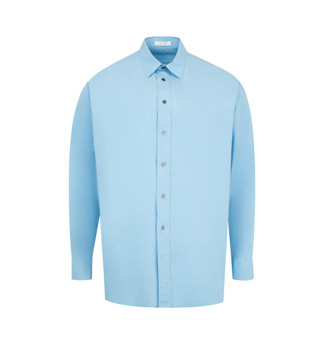 Image 1 of 2 - BLUE - THE ROW Miller Shirt featuring classic button-up shirt in washed cotton poplin with slim back yoke, curved hem, and exposed front placket with mother-of-pearl buttons. 100% cotton. Made in Italy.
