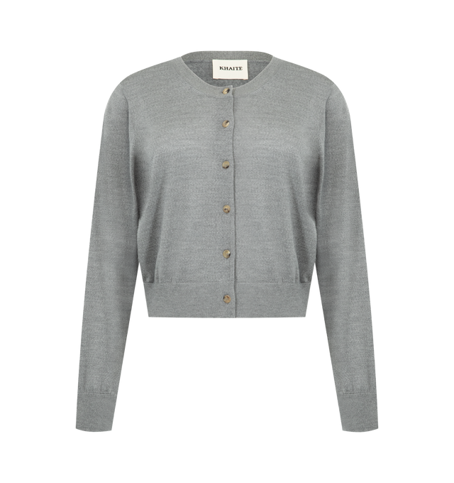 Image 1 of 2 - GREY - Khaite refined cardigan made in Italy of a fine blend of wool and cashmere selected for its sculptural softness. Finished with born buttons and ribbing at the crewneck, hem, and cuffs. 80% wool, 20% cashmere.