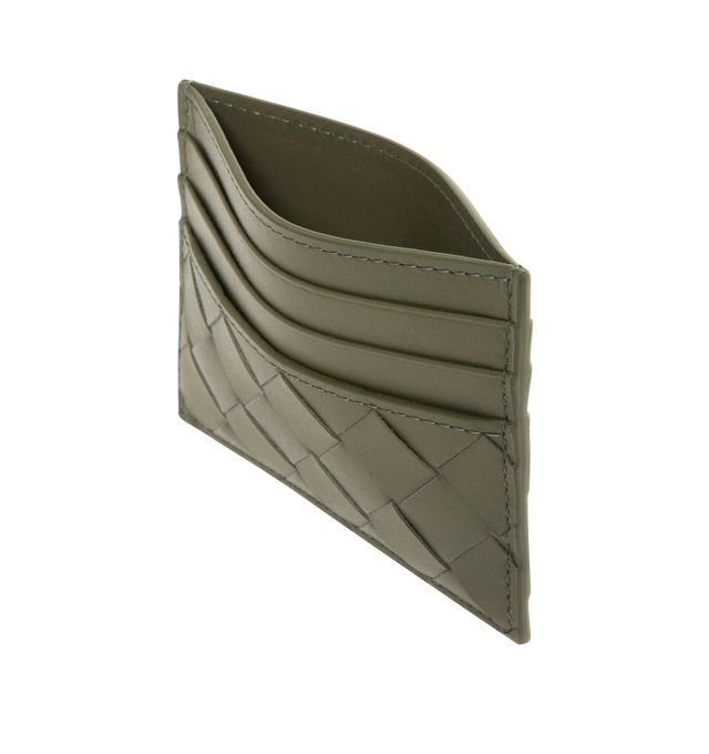 Image 3 of 3 - GREEN - BOTTEGA VENETA Intrecciato Credit Card Case featuring six card slots, one central pocket and intrecciato calf leather. 3.1" x 4.1" x 0.2". Calfskin. Made in Italy.