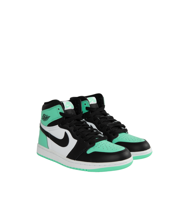Image 2 of 5 - GREEN - Air Jordan 1 Retro High OG "Green Glow" classic sneaker crafted from premium materials in a fresh mint green color. Leather upper offers durability and structure.Encapsulated Air-Sole units provide lightweight cushioning. Solid rubber outsoles give you traction on a variety of surfaces. Signature Wings logo stamped on collarStitched-down Swoosh logo.