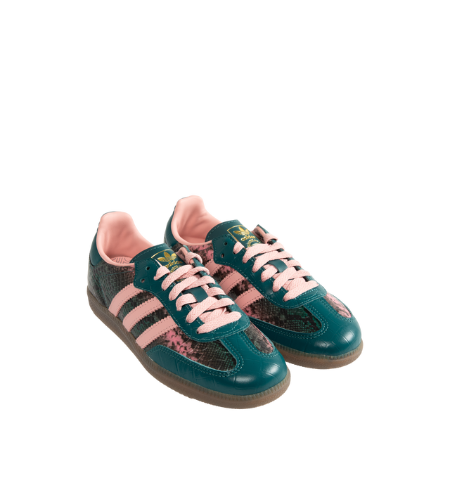 Image 2 of 5 - GREEN - Adidas Women's Samba OG Shoes reinterpret the brands iconic soccer-inspired silhouette with premium leather construction and heritage detailing. Designed with a lace-up closure and the signature elongated tongue, this updated version pairs classic Samba styling with modern versatility. Metallic Samba branding and Trefoil detailing celebrate the legacy of adidas Originals, while the durable rubber outsole provides reliable traction for everyday wear. Main Material: Leather. Closure: La