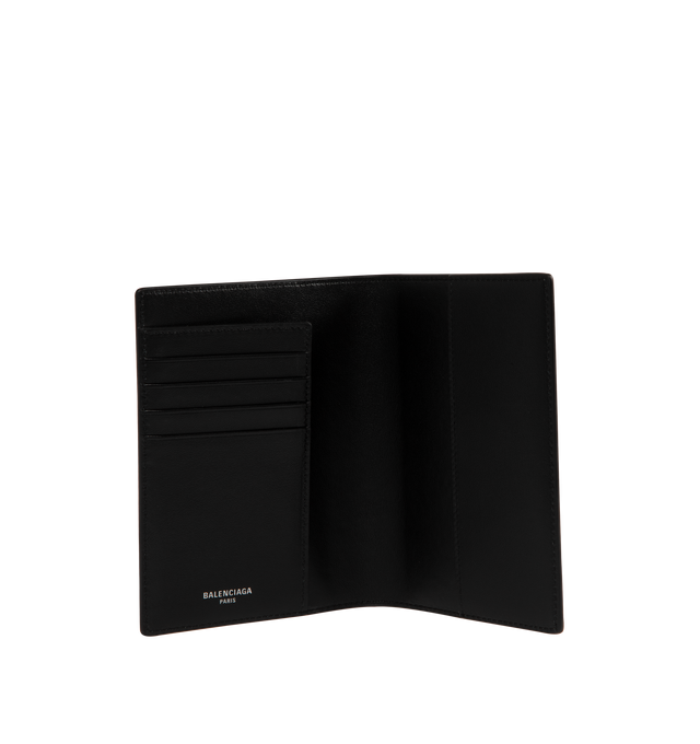 Image 3 of 3 - BLACK - Balenciaga Logo Passport Holder has 4 card slots, 1 flat pocket, and a signature brand logo printed on the front. 3.9 x 5.5 0.6 inches. 100% calfskin. Made in Italy.