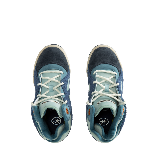 Image 5 of 5 - BLUE - Adidas Originals x Bad Bunny Men's BADBO 1.0 Unisex Shoes feature a bold, contemporary silhouette that reflects the latest collaboration between adidas Originals and Bad Bunny. Designed with premium materials and distinctive detailing, this statement sneaker blends sport-inspired functionality with the artist's signature creative vision, delivering a modern look rooted in self-expression and individuality. Upper: Nubuck with hairy suede overlaysOutsole: Rubber.