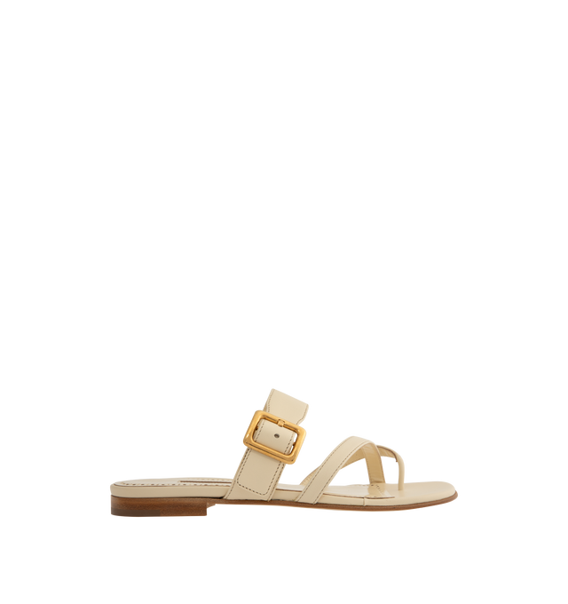 Image 1 of 4 - NEUTRAL - Manolo Blahnik Thalusa nappa leather flat sandals featuring an open toe, crossover front straps with toe stem, instep strap with gold buckle design detail and flat stacked 10mm heel. Upper: 100% lamb nappa. Sole: 100% calf leather. Lining: 100% kid leather. Made in Italy.