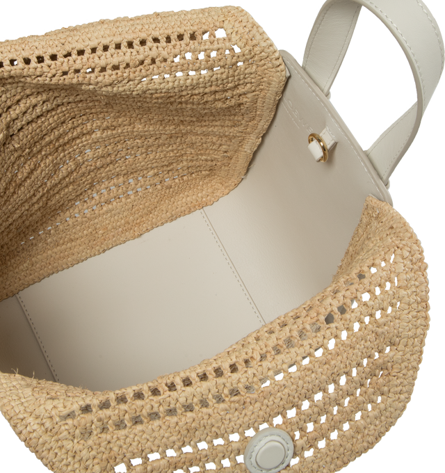 Image 3 of 3 - WHITE - Loewe Paula's Ibiza Compact Hammock bag in raffia and calfskin with supple side panels that release to change its shape, with a distinctive wing design that can be folded in or out to create multiple silhouettes and offer secure fastening thanks to concealed magnetic closures. This compact version is crafted in handwoven raffia and calfskin. Featuring detachable and adjustable strap for shoulder, crossbody or top handle carry, interior hook closure, external zip pocket and two interna 