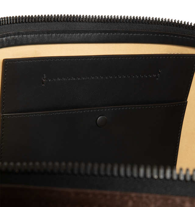 Image 3 of 3 - BROWN - MONCLER Carlo Suede Duffle Bag featuring micro suede lining, leather trim, leather handles, adjustable and detachable shoulder strap, inner pocket with snap button closure and embossed logo. L 42 cm x H 31 cm x D 22 cm. Leather. Lining: 91% polyester, 9% elastane/spandex. Made in Italy.