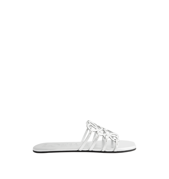 Image 1 of 4 - SILVER - LOEWE Petal Anagram Slide in laminated lambskin featuring a cut-out Anagram upper with hand-painted edges and hand-stitched seams, 5mm heel, embossed LOEWE on the insole, padded leather insole, rubber-injected island on the outsole and hand-stitched seams. Laminated lambskin. Made in Italy.