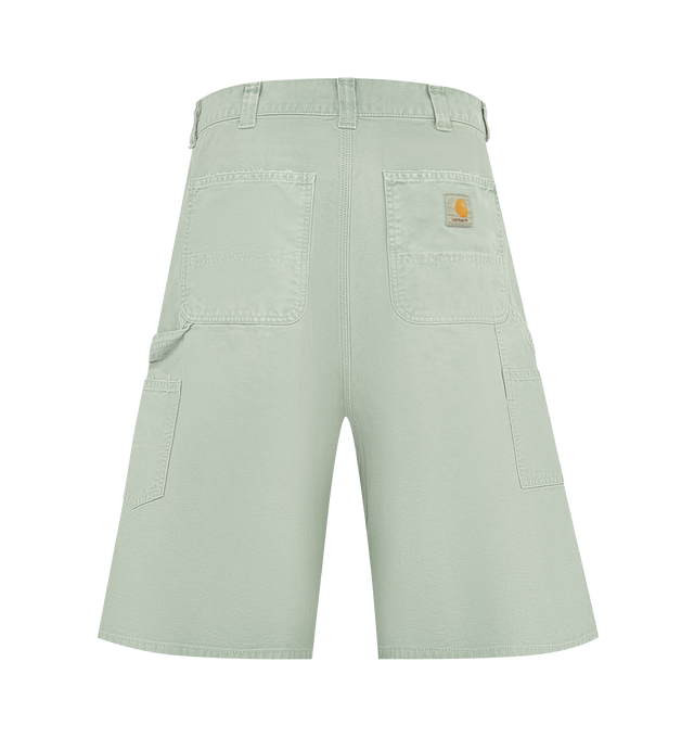 Image 2 of 3 - GREEN - Carhartt WIP Mens OG Double Knee Shorts are crafted from heavyweight Dearborn canvas with a distressed washed finish. Feature a wide fit with a regular waist, double-layer knees, tool pockets, hammer loop, triple stitching, bartack stitching and rivets at stress points, zip fly, and woven Square Label. Main Material: 100% Organic Cotton Canvas. Made in Tunisia.