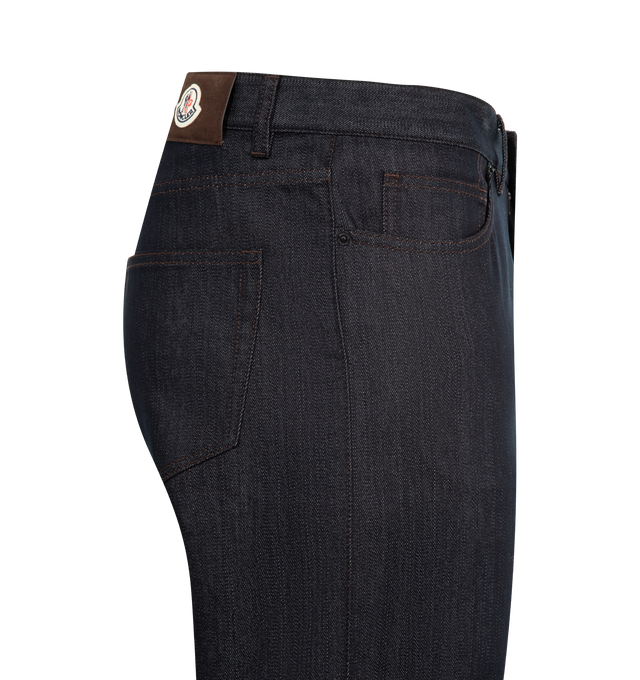 Image 3 of 3 - NAVY - MONCLER Straight Leg Denim Jeans featuring comfort denim, zipper and snap button closure and logo patch. 75% cotton, 24% polyester, 1% elastane/spandex.