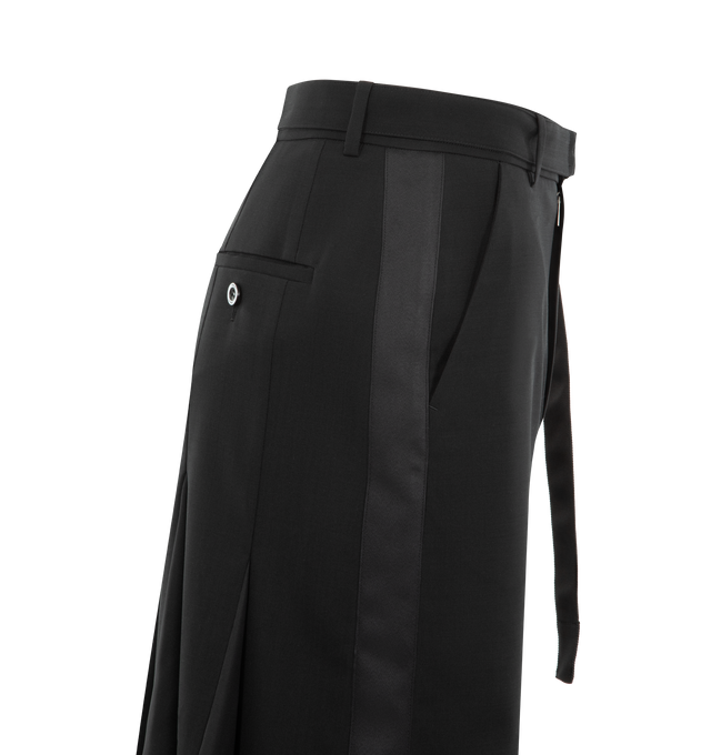 Image 3 of 3 - BLACK - SACAI Belted Wool Suiting Skirt featuring pencil skirt cut from wool suiting fabric, glossy satin tuxedo stripes, webbed belt, zip fly with hook-and-bar closure, cupro lining and front vent. 100% wool with 100% polyester contrast. Made in Japan.